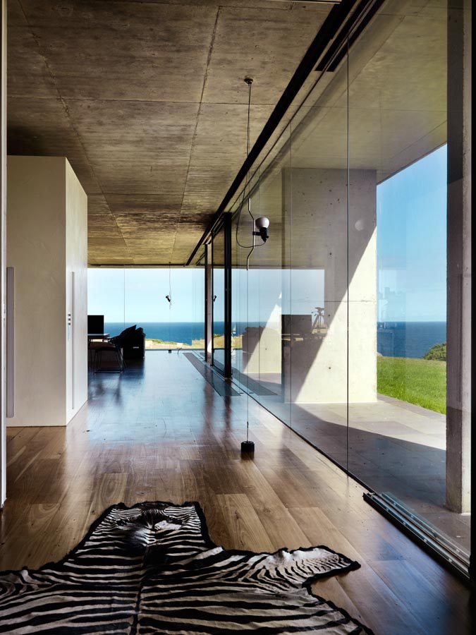 Floor to ceiling glass windows allow natural light into all living areas at this photo shoot location