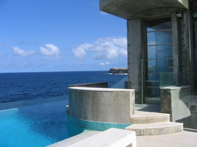 A poolside location with ocean views for photo shoots