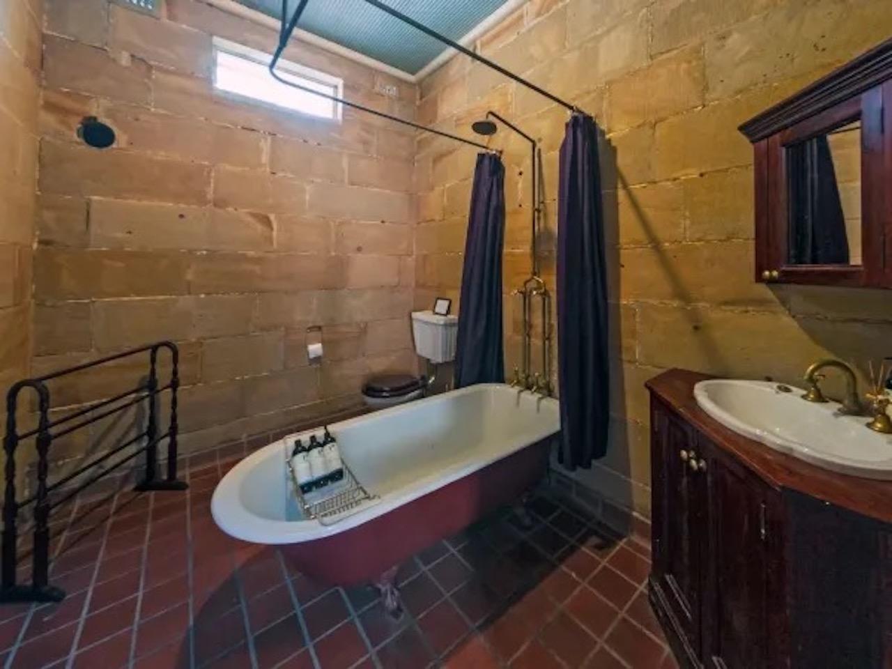 Claw foot bath in sandstone block house, historic location 