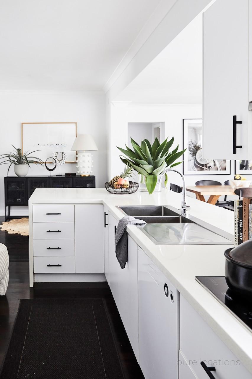 Dark floor with white kitchen, kitchen design Sydney
