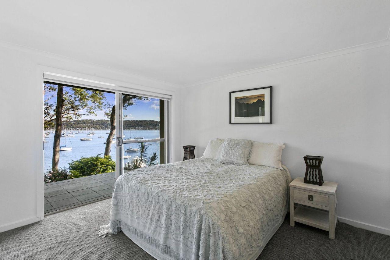 Coastal bedroom with water views