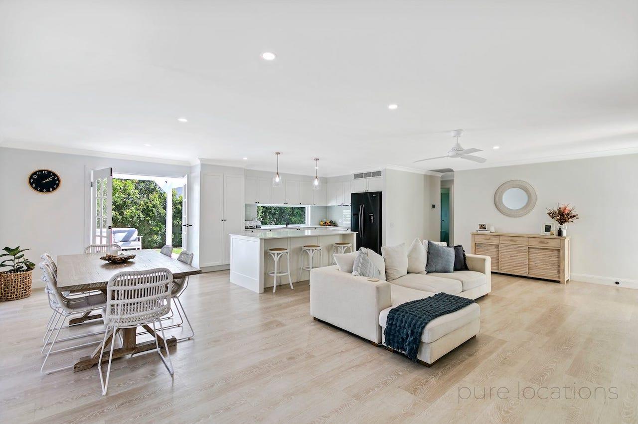 Coastal home for photoshoots and filming, blonde timber floors with open plan kitchen dining
