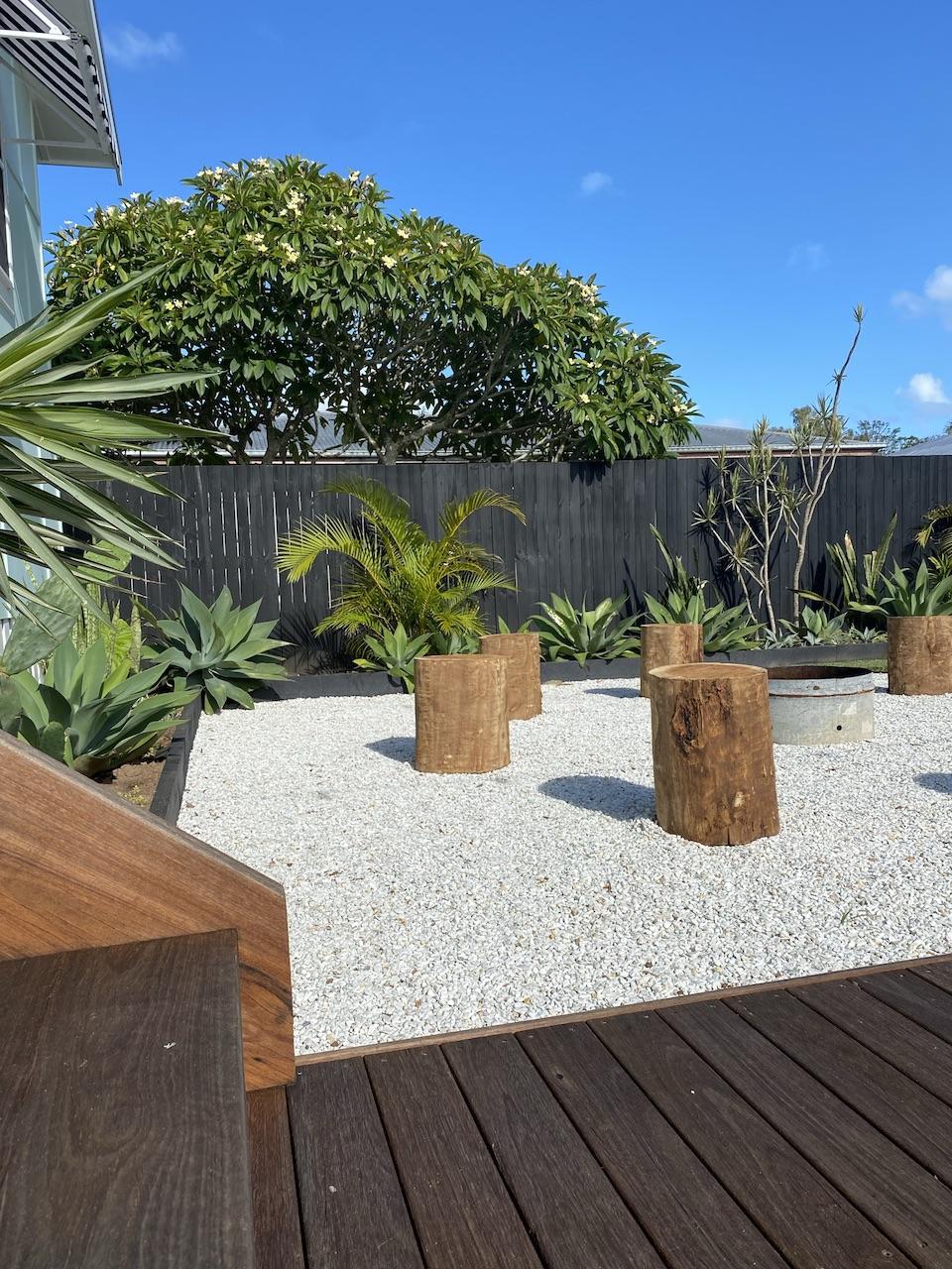 Fire Pit, gravel and stumps, outdoor space for film, decking ideas