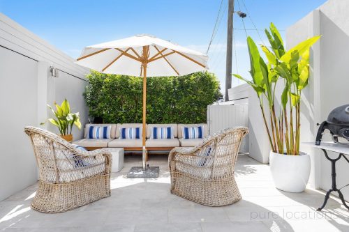 outdoor area backyard garden established garage facade driveway