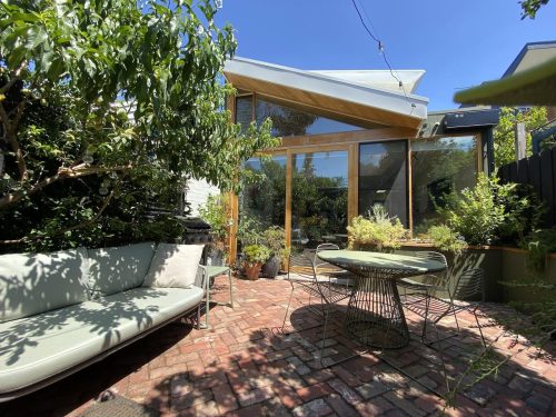 outdoor area backyard pool facade garage driveway