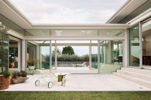 outdoor area facade garage driveway backyard garden established pool