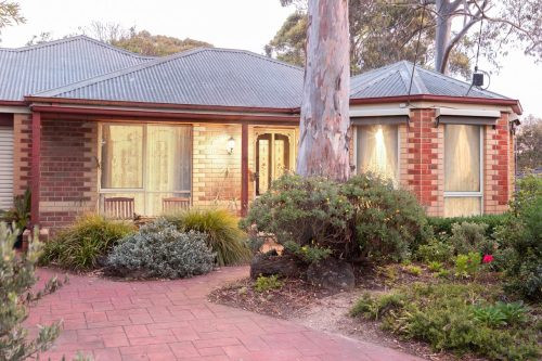 facade garage driveway backyard garden established pool