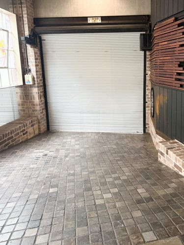 garage driveway facade backyard garden established pool