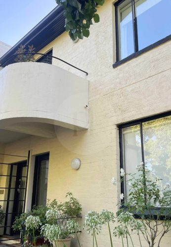 outdoor area facade garage driveway backyard pool