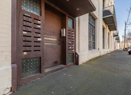 facade garage driveway backyard pool outdoor area garden established