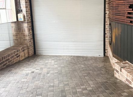 garage driveway facade backyard garden established pool