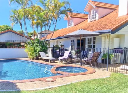 outdoor area facade pool garage driveway garden established backyard